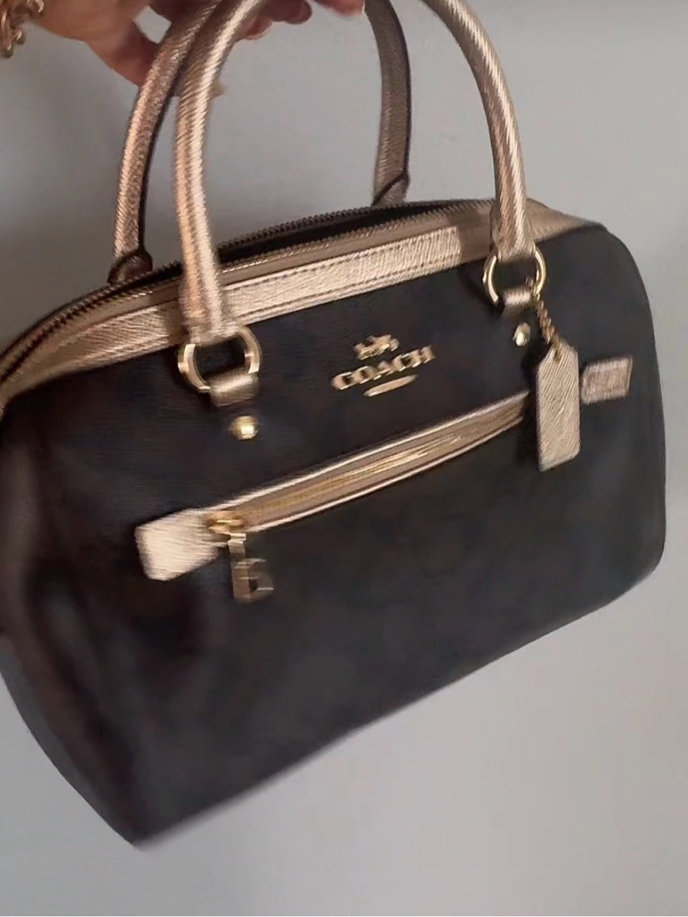 Coach Black Satchel with Metallic Gold Trim and Handles